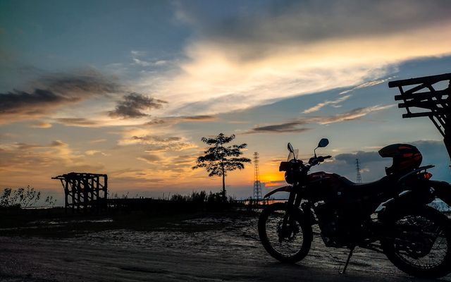 a motorcycle parked on a road
