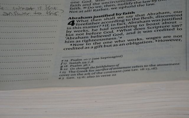 A close up of a book with writing on it