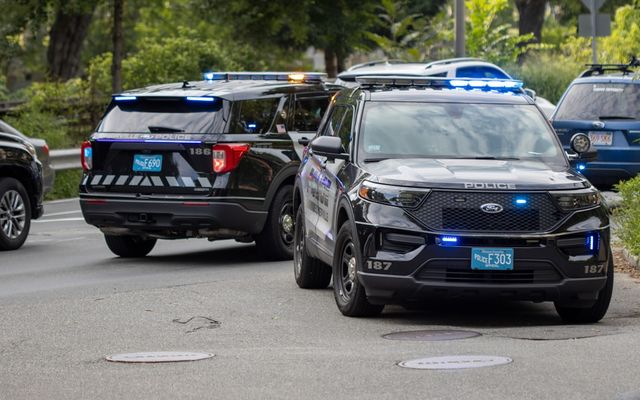 black mercedes benz suv on road during daytime