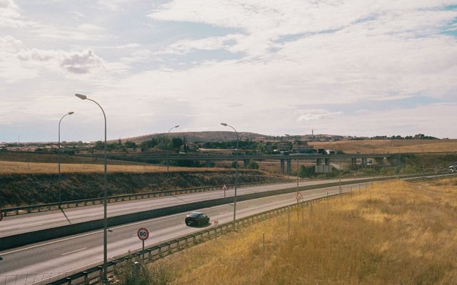 a car driving on a highway