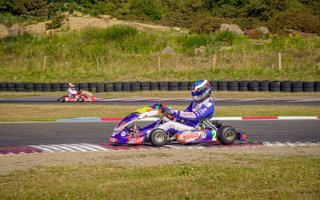 Young driver behind the wheel of a car