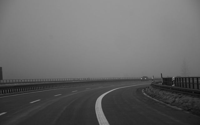 Empty highway on a foggy day