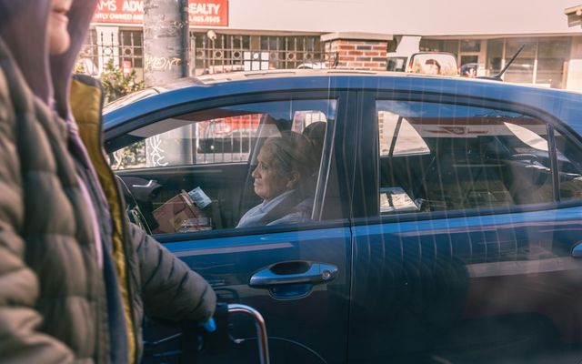 Senior driver behind the wheel of a car