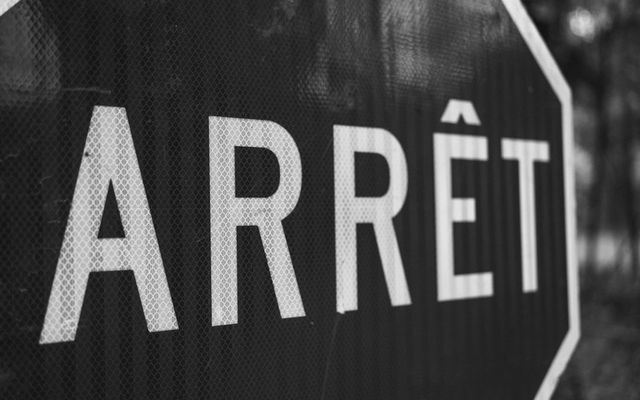Close-up of a french stop sign