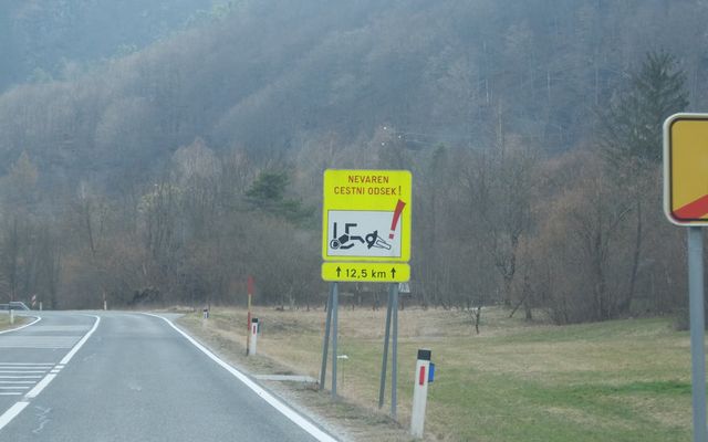 Yellow warning sign with pictogram of falling person