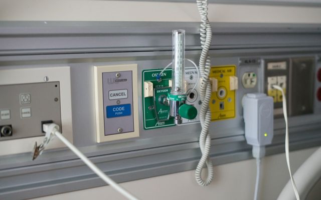 Medical gas outlets and electrical sockets on wall