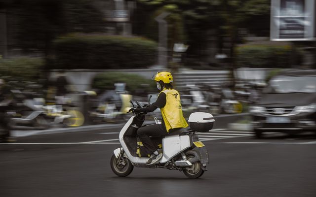 a person riding a scooter