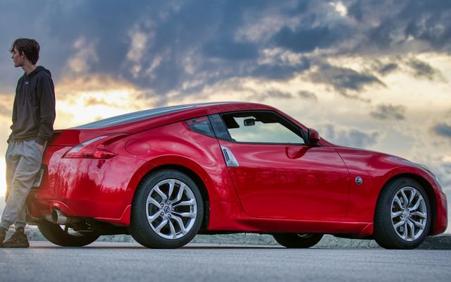 Young driver behind the wheel of a car