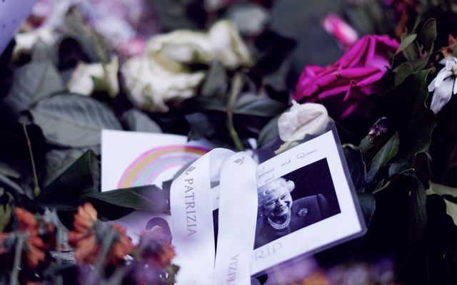 a cell phone in a bouquet of flowers