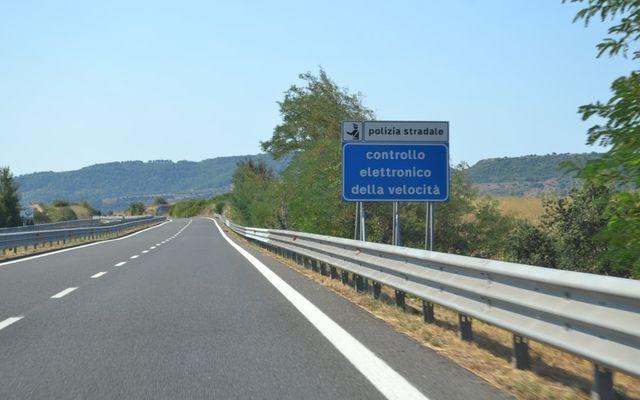 Speed limit sign on a highway