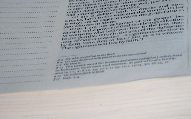 A close up of an open book on a table