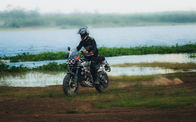 Motorcyclist riding on an open road