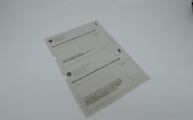 white printer paper on white surface