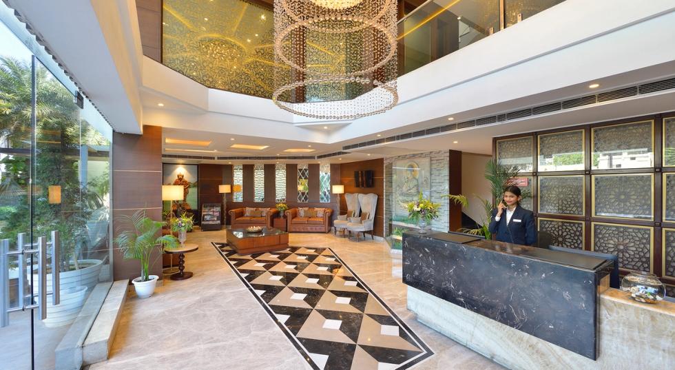 Modern hotel lobby and reception desk in Bhopal near Shahpura Lake with elegant decor.