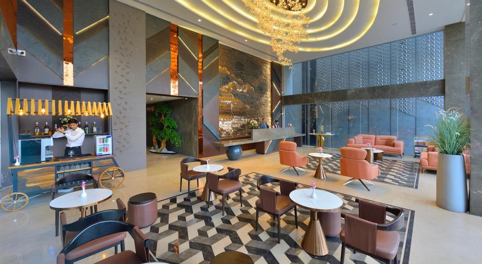 Lobby at Ginger Ajmer Hathi, Bhata hotel with seating area and reception.