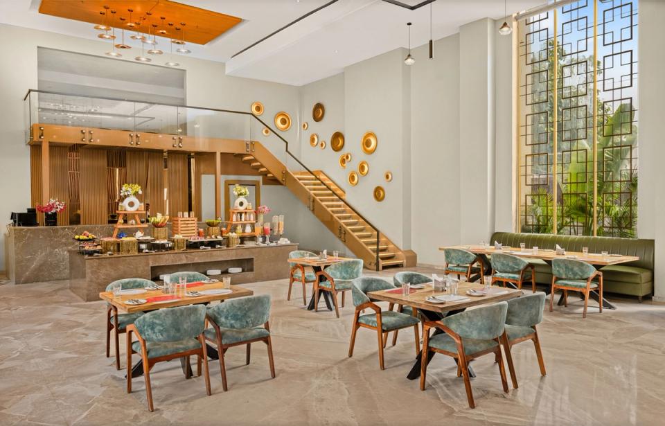 Dining area at Qmin Etawah, Gwalior Bypass Road