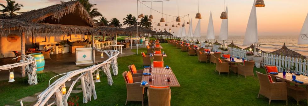 Beach restaurant with open lawn and ocean horizon