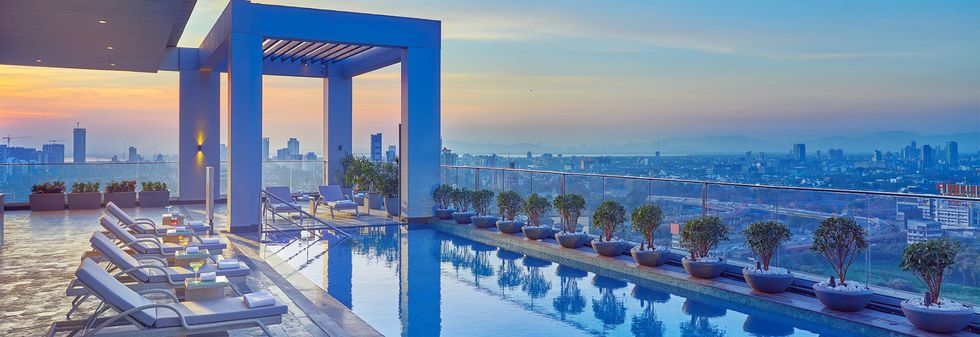Luxury Rooftop Hotel Pool Area at Vivanta Navi Mumbai