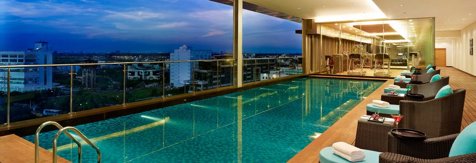 Luxurious Rooftop Pool and Fitness Center at Vivanta Kolkata