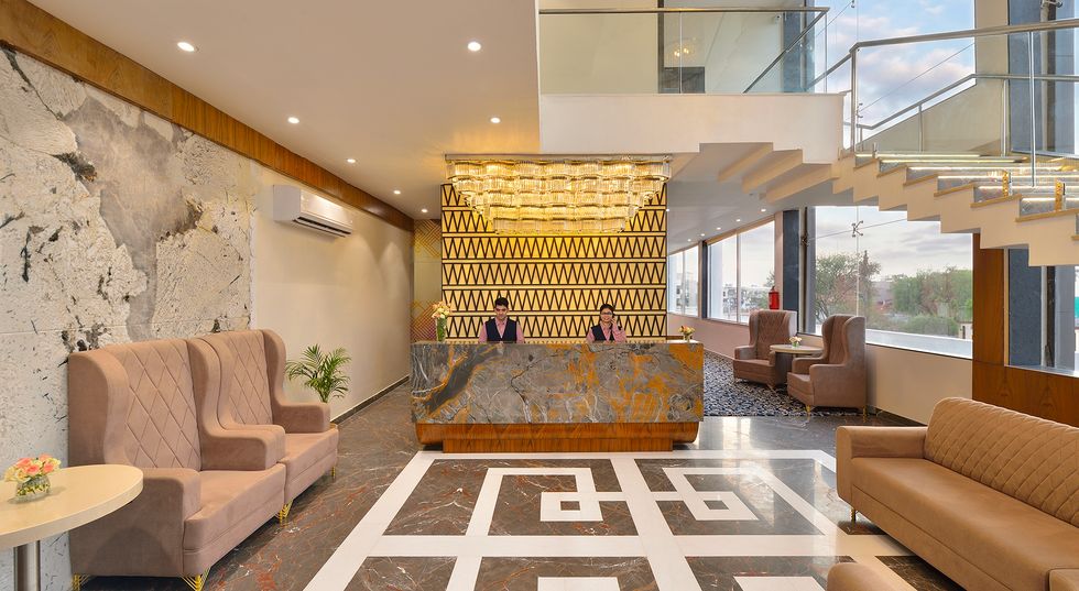 Reception lobby seating area at Ginger Gadchiroli Mul Road hotel.
