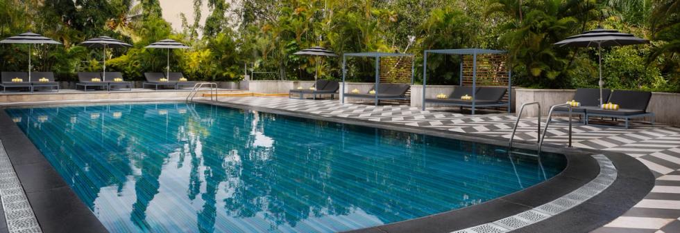 Outdoor Pool Area at Vivanta Bengaluru, Residency Road