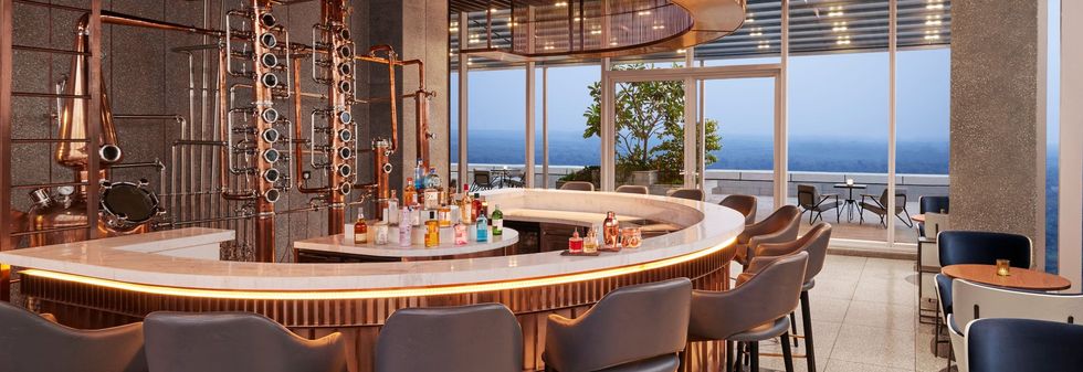Bar interior with warm lighting and comfortable seating