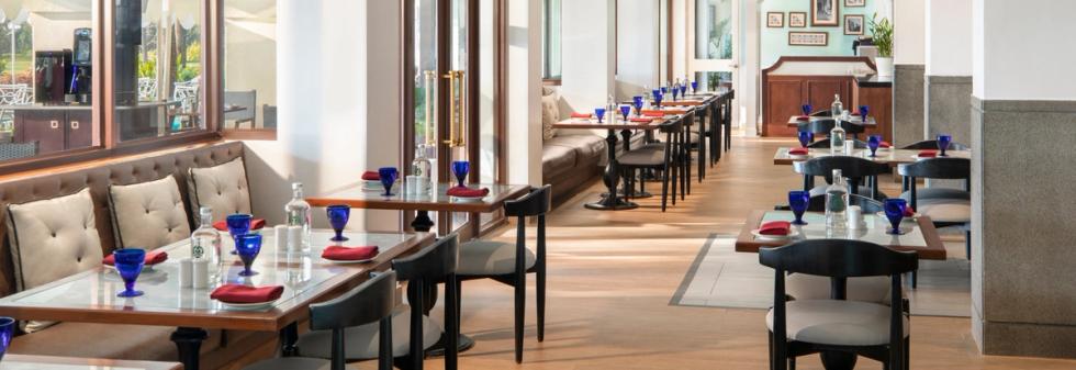 Bright restaurant interior with neatly arranged dining tables