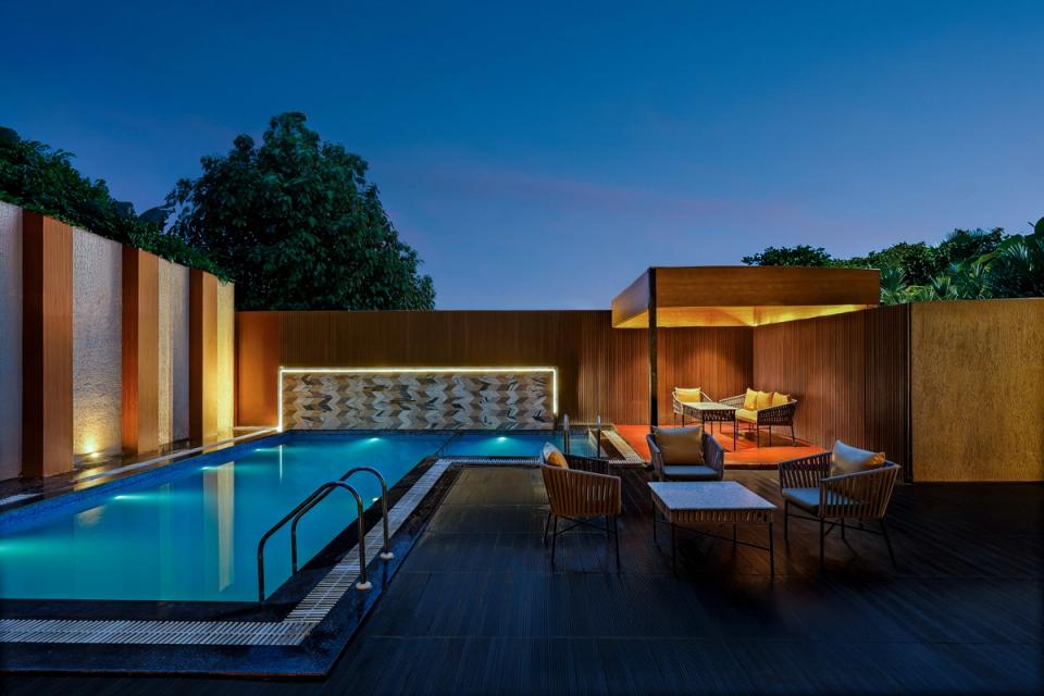 Swimming pool night view at Ginger Etawah, Gwalior Bypass Road