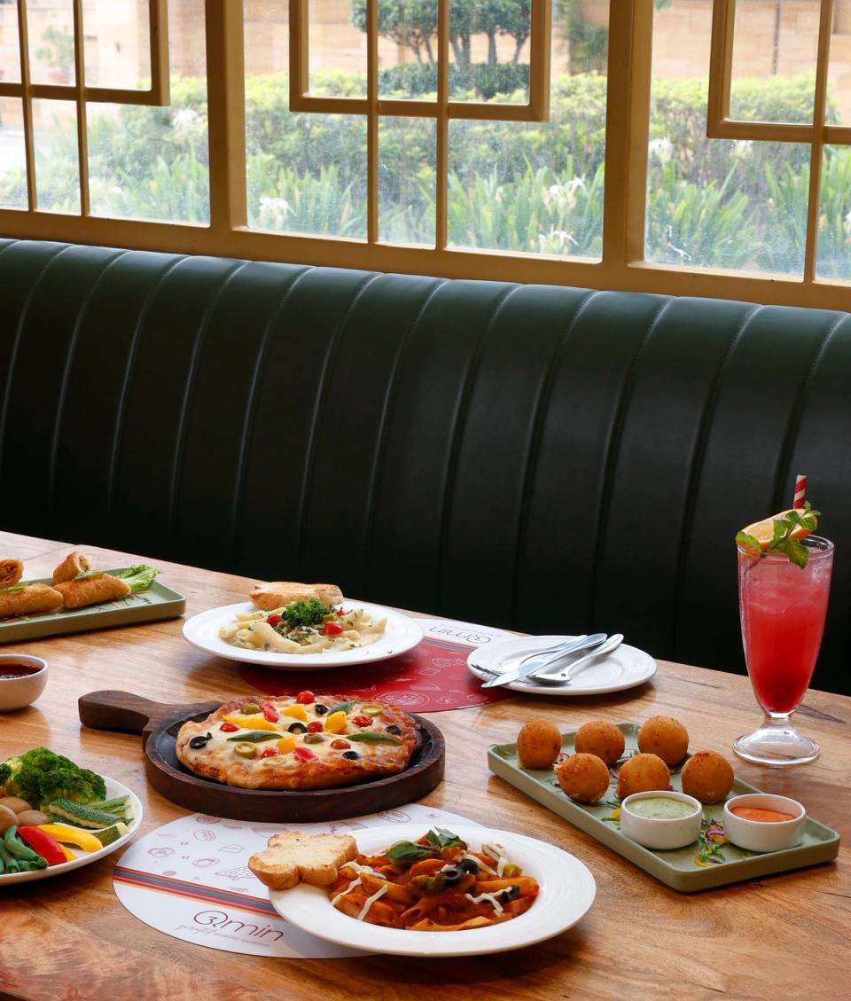 Dining table setup at Qmin