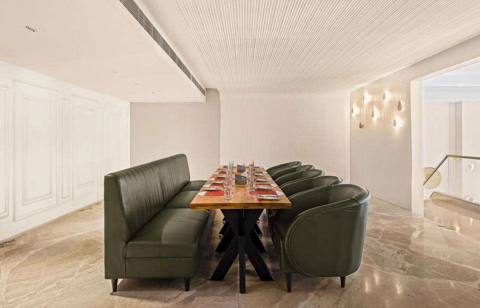 Dining seating area at Qmin Etawah, Gwalior Bypass Road