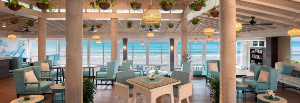Coastal bar counter with cocktails and natural light
