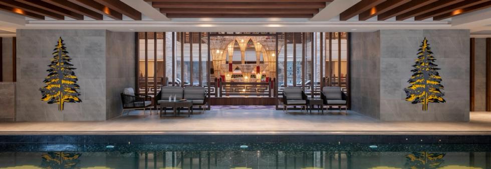Poolside lounge area at luxury hotel in Tawang