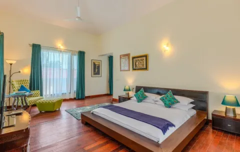 Spacious Bedroom at 25 Farm House, Kolkata - amã Stays & Trails 