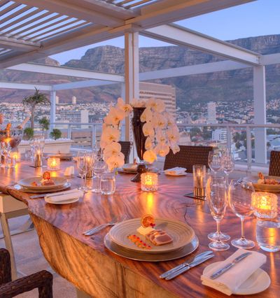 Elegant Candlelight Setup For Fine Dining At Taj Cape Town