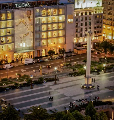 Watching the Union Square Bustle Below from your Room - Taj Campton Place, San Francisco