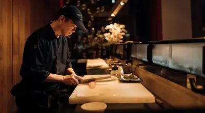 Chef Preparing Dish at Wasabi by Morimoto