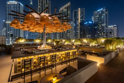 Refined dining and bar setting at Tree House - Taj Dubai