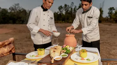   Taj Staff Serving Food at Banjaar Tola, a Taj Safari  