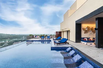 Luxury Lounge View with Pool at Taj Lakefront, Bhopal