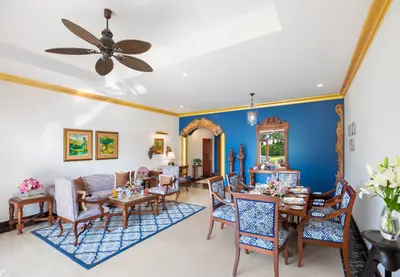 Impressive Living Area with Dining Table in Rooms & Suites - Taj Exotica Resort & Spa, Goa