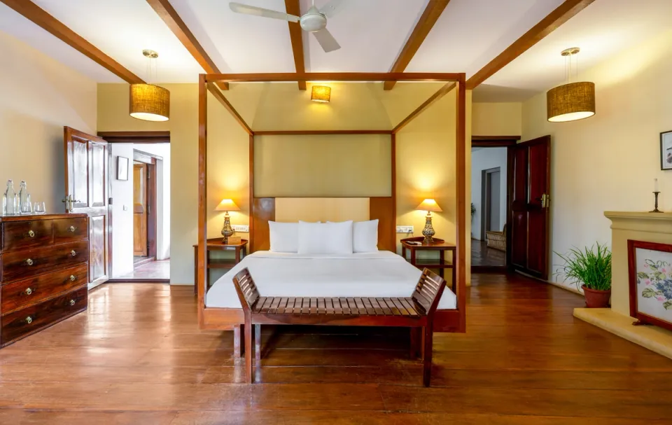 Stunning Bedroom at Taneerhulla Bungalow, Coorg - amã Stays & Trails