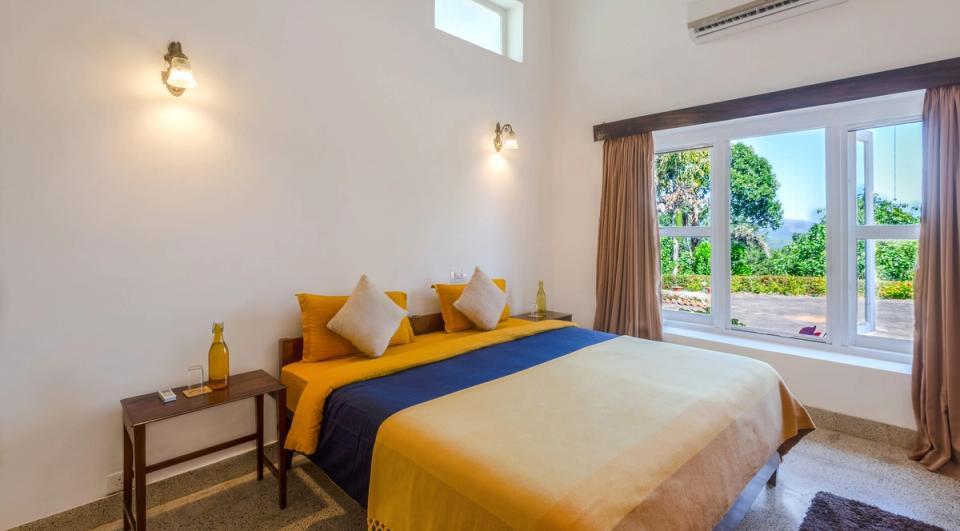 Stunning Bedroom at Pollibetta Bungalow - Accommodation in Coorg