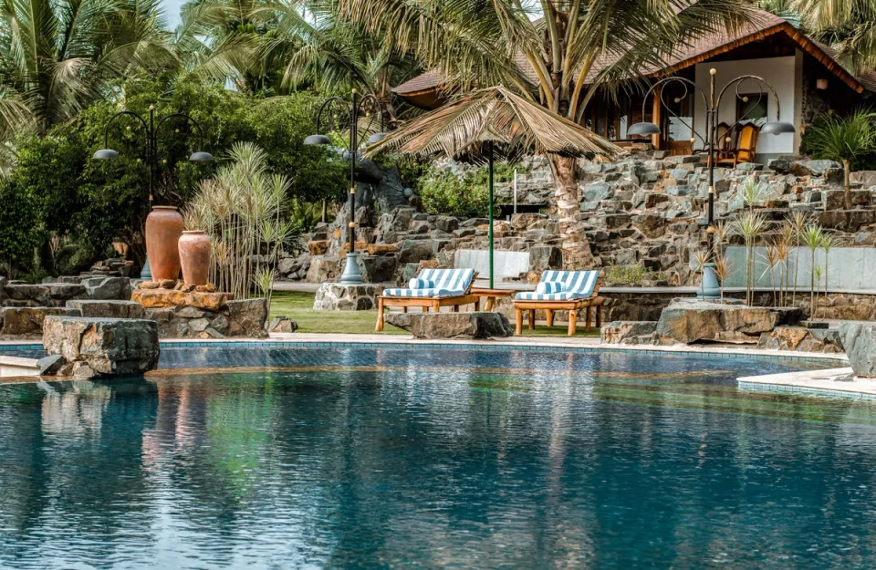 Luxe Poolside Recliners at Eden Farms Aqua Marine, Goa - amã Stays & Trails