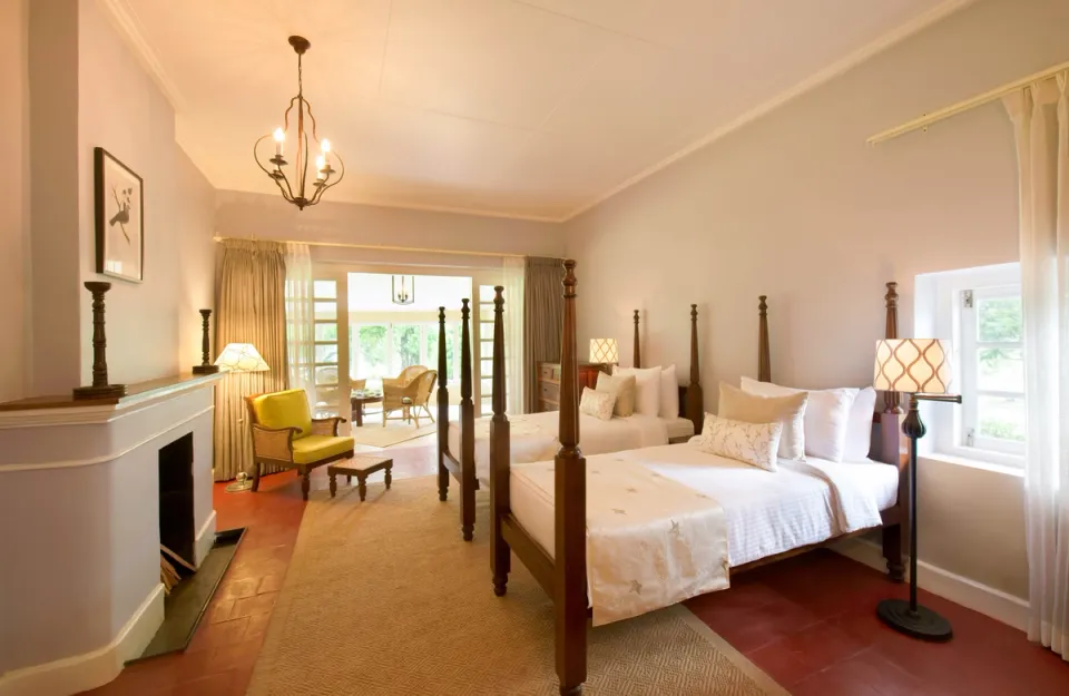 Spacious Bedroom at Sevenmallay Bungalow - Stay In Munnar