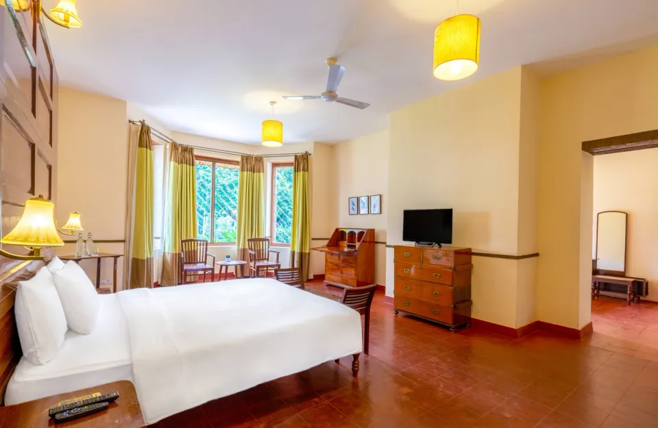 Elegant Bedroom at Taneerhulla Bungalow, Coorg ,amã Stays & Trails