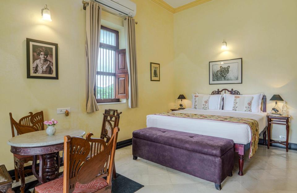 Elegant Bedroom at Abhay Manor,  amã Stays & Trails 