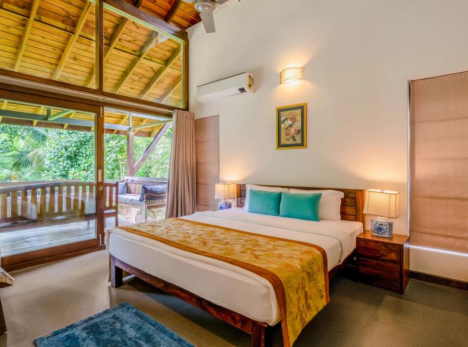 Luxury Bedroom at The Old Cattle Shed, Wayanad - amã Stays & Trails