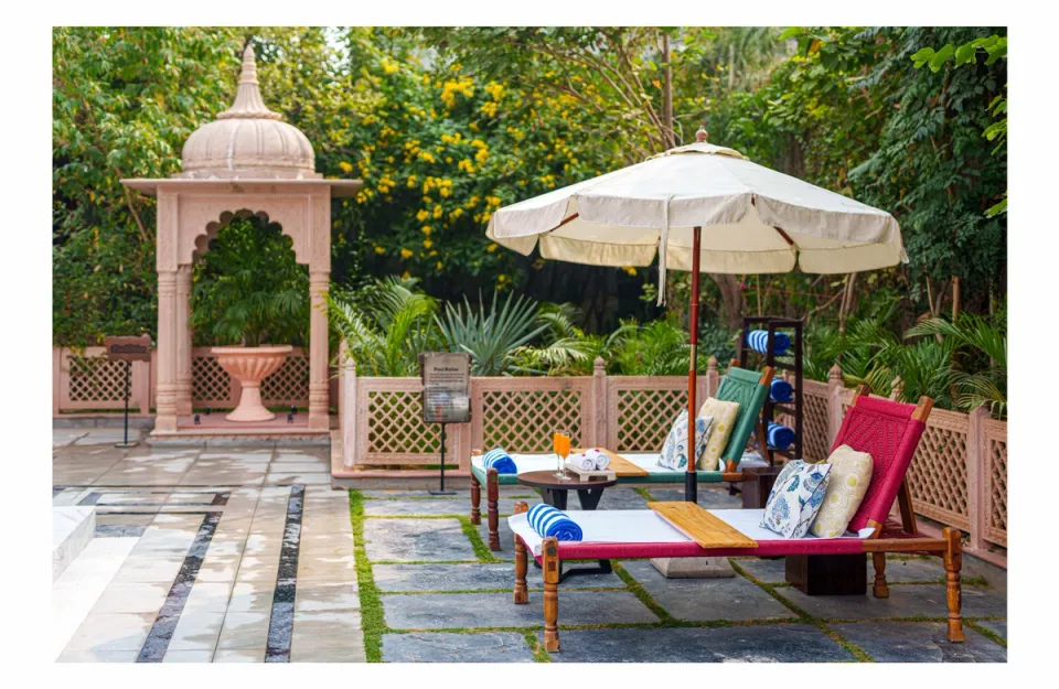 Poolside Recliners at Rang Mahal, Jaipur - amã Stays & Trails