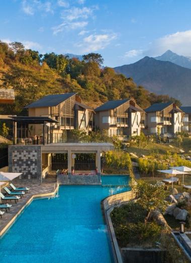 Exterior view of a luxury hotel in Dharamshala