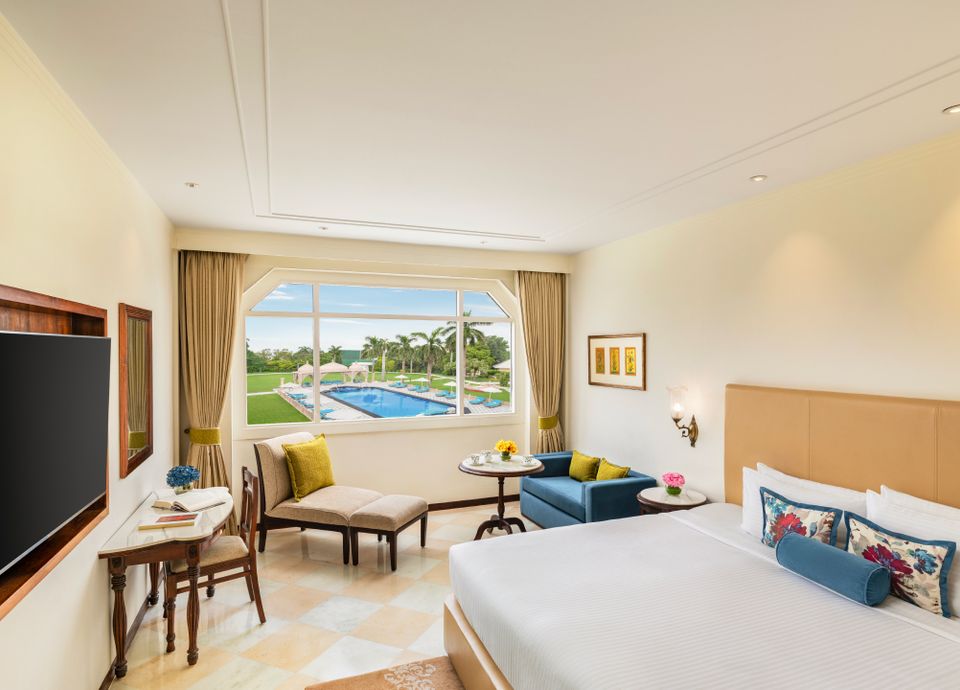 Deluxe King Bed Room with Pool View at Tajview Agra